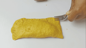 Use a fork to press the edges to stick together