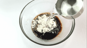 Add cornstarch and 1/2 cup of water