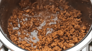 Add 300 ml of water to the chili