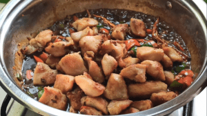 Also, bring the fried chicken into the Kung Pao Chicken Sauce and then mix everything to combine.