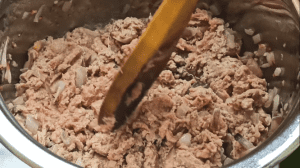 Break the ground beef with a spatula