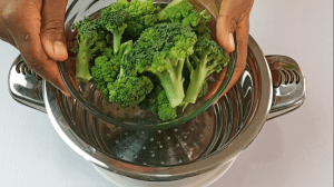 Add the broccoli florets to the steamer basket