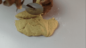 Flatten the dough and cut into small chunks