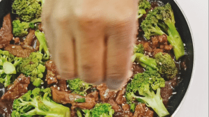 Garnish the beef and broccoli stir fry with some sesame seeds