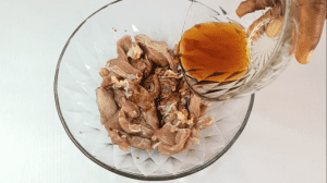 Add Shaoxing rice wine and light soy sauce for marinating the beef