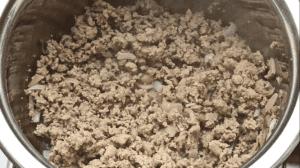 Cook the ground beef until it is no longer pink in color