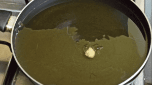 Place a pan on heat and add oil for frying the dumplings