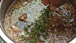 Add thyme to the Irish stew