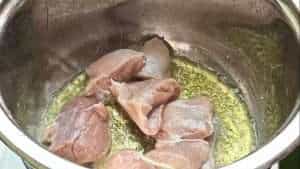 Bring in the lamb into the oil and fry
