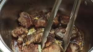 Stir fry the lamb until they are golden brown in color