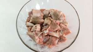 Season the lamb with salt and black pepper powder