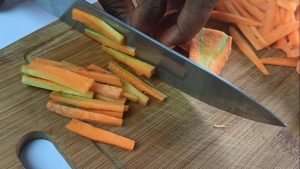 Slice the carrots into thin strands
