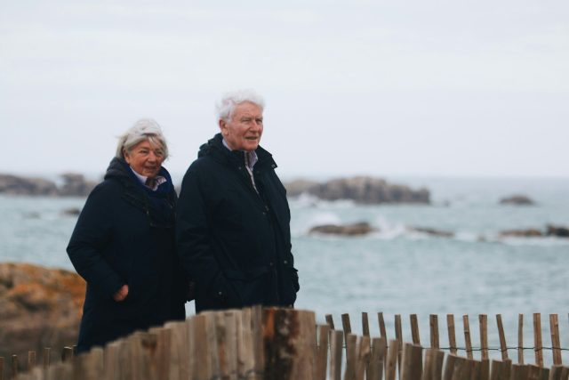 a couple of people standing next to each other