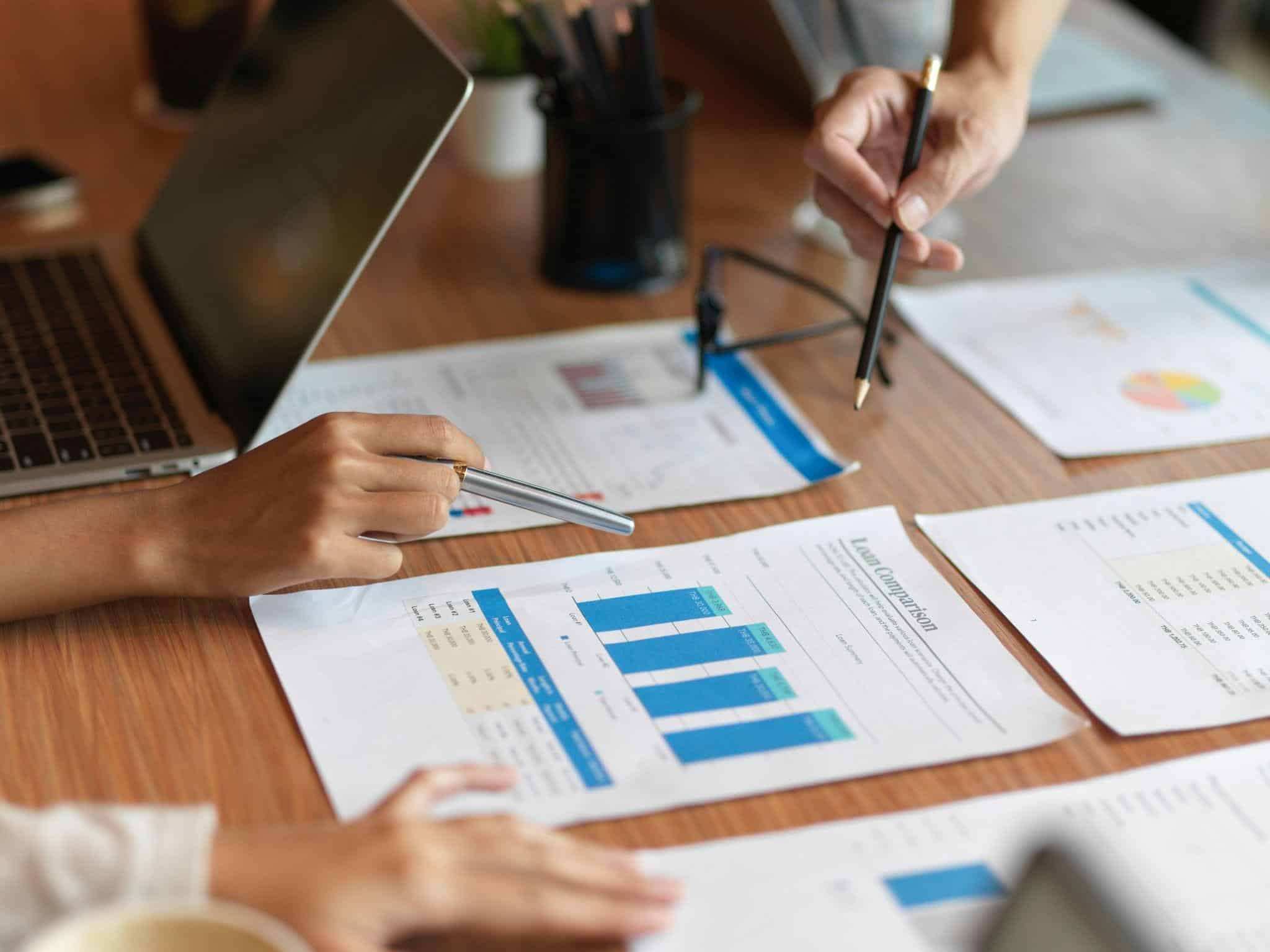 alt text two people reviewing a loan comparison